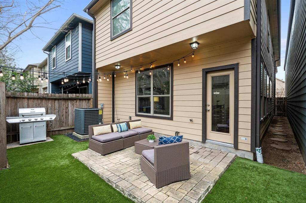 A Backyard That’s All Fun, No Fuss. Zero lawn maintenance, string lights for cozy vibes, and a cobblestone patio perfect for BBQs, fire pits, or wine under the stars. Your own private outdoor oasis, right at home.