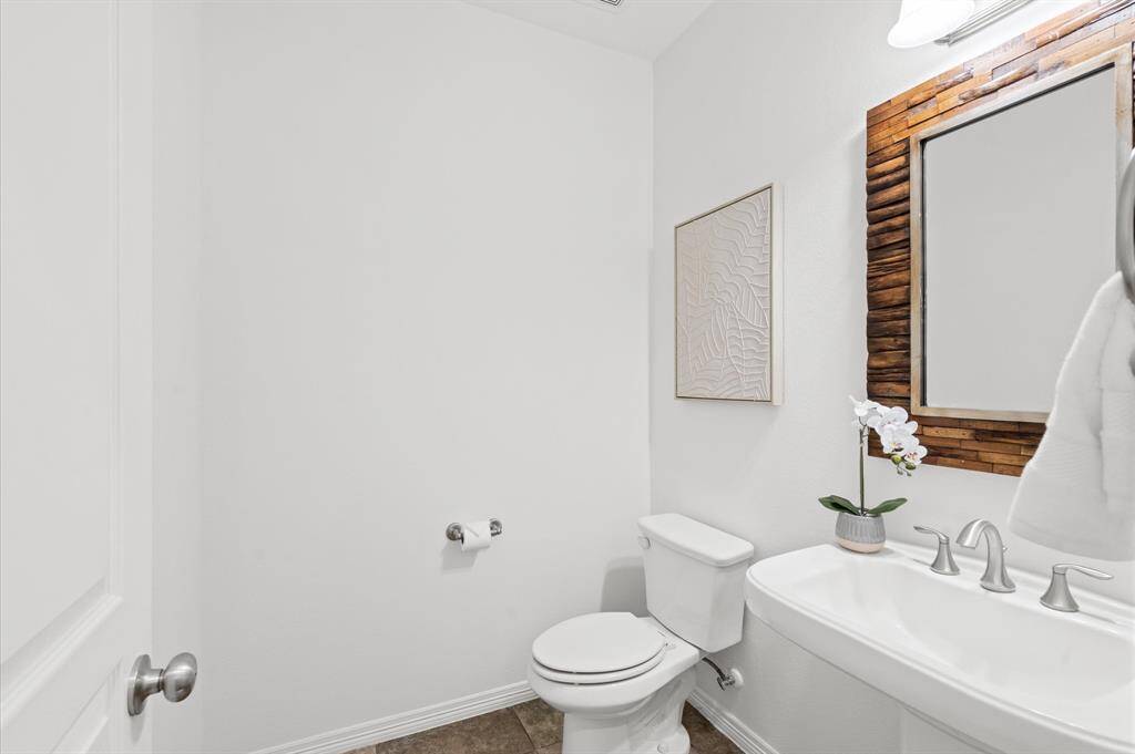 The Perfect Powder Room. Simple, stylish, and conveniently located—this powder room keeps things easy for guests (and for you!).