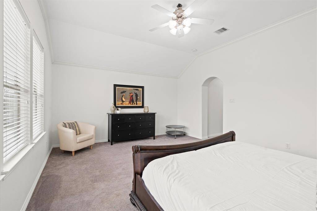 Room for Everything (Even That Reading Nook You’ve Always Wanted). With vaulted ceilings and extra space for a sitting area, this primary suite is a vibe.
