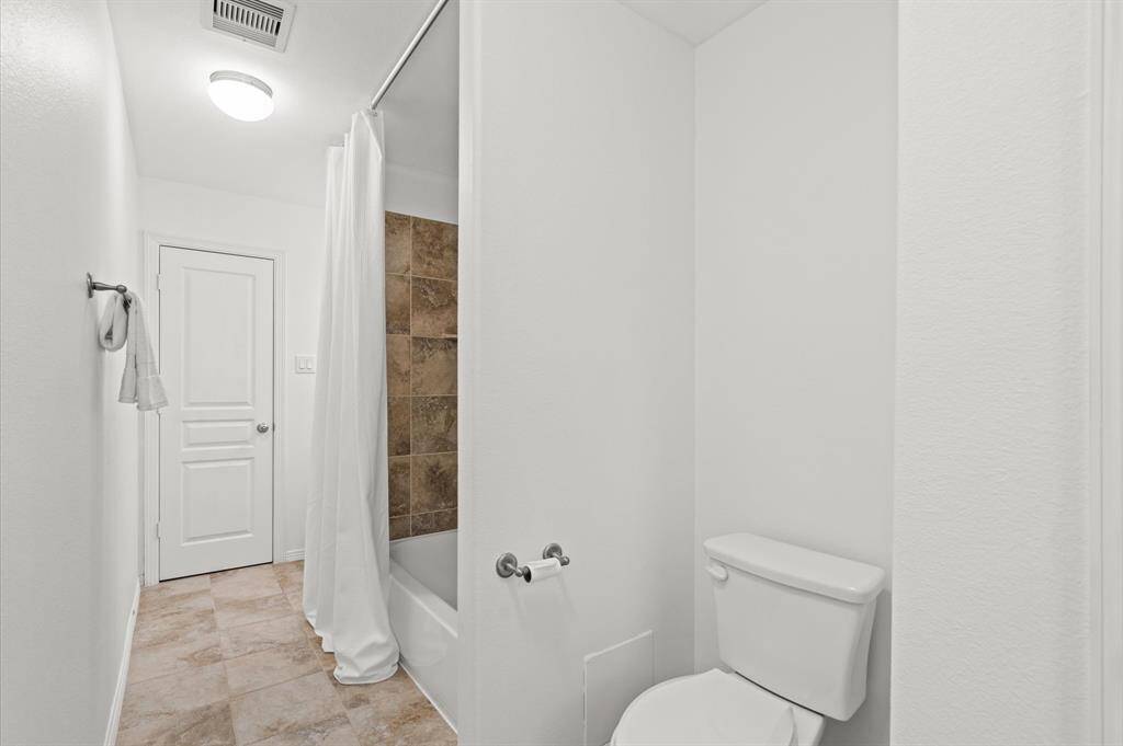 Simple, Stylish & Functional. With neutral finishes, great storage, and a practical layout, this secondary bath is designed for everyday convenience.