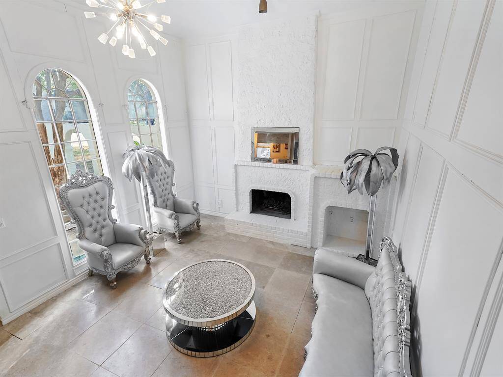 Living room offers high ceilings and ample space for entertaining