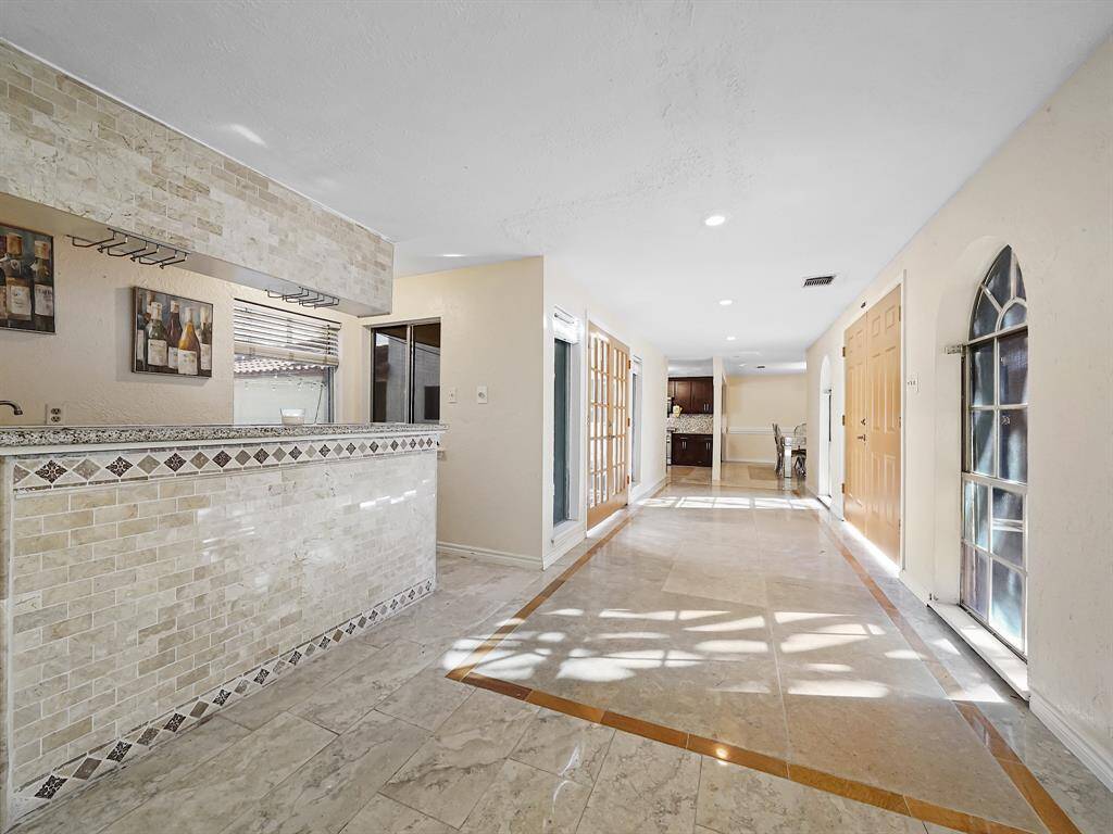 Front hallway leading to dining room