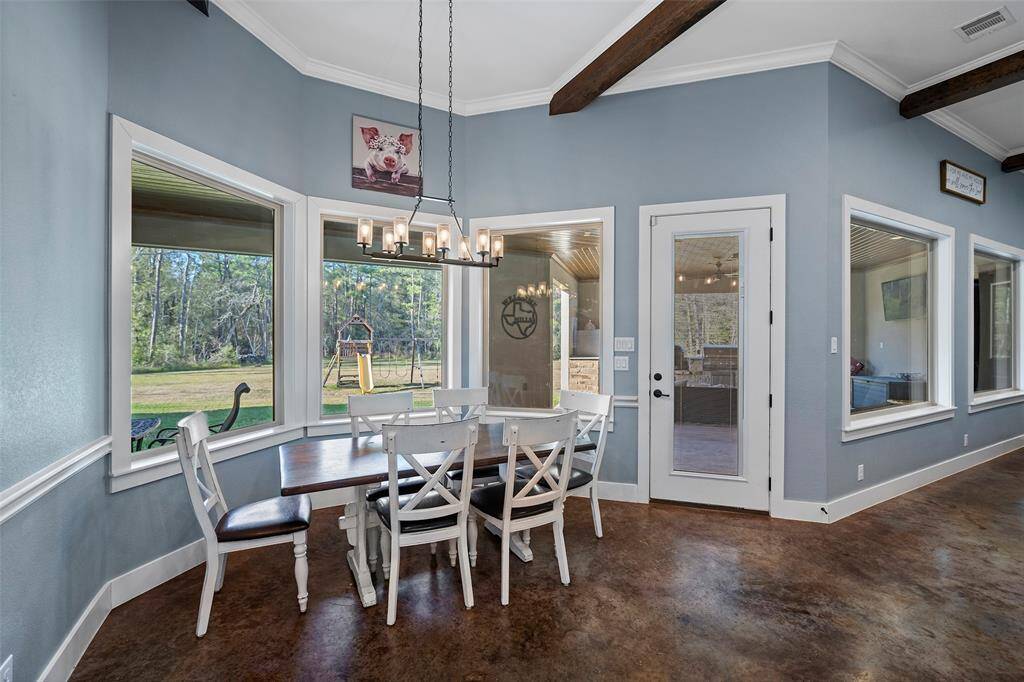 Look at those views from the breakfast room!  Love the big beautiful windows.