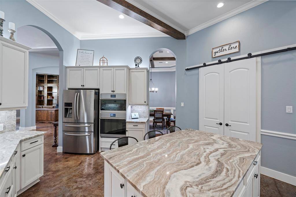 Barn door walk-in pantry.