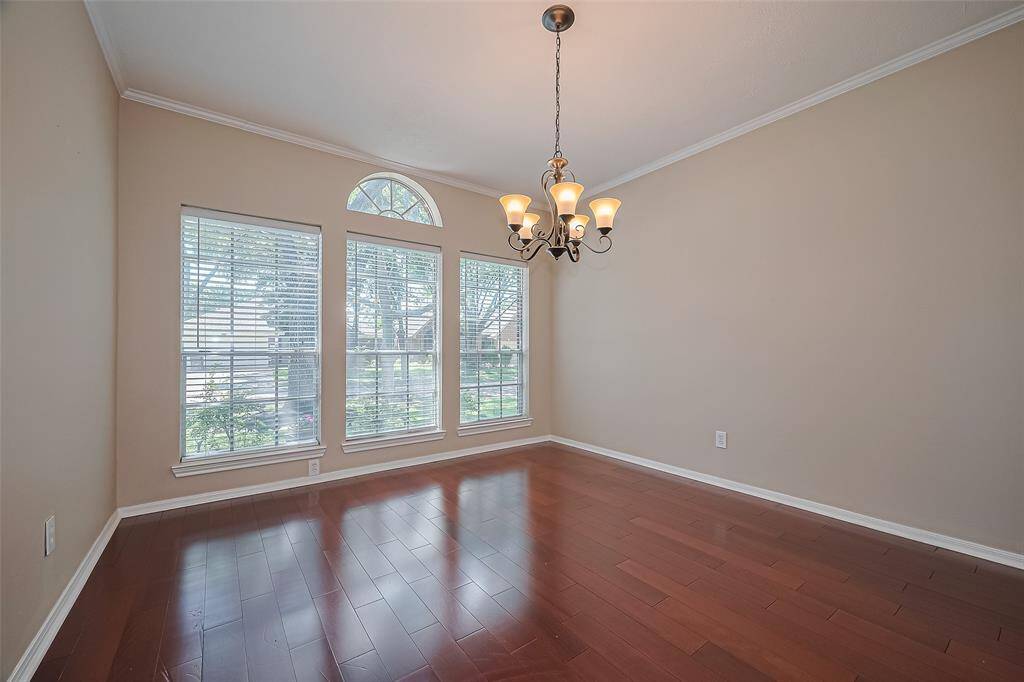 Formal Dining Room at front of the home w/great windows for natural lighting and a nice view of your beautiful front yard