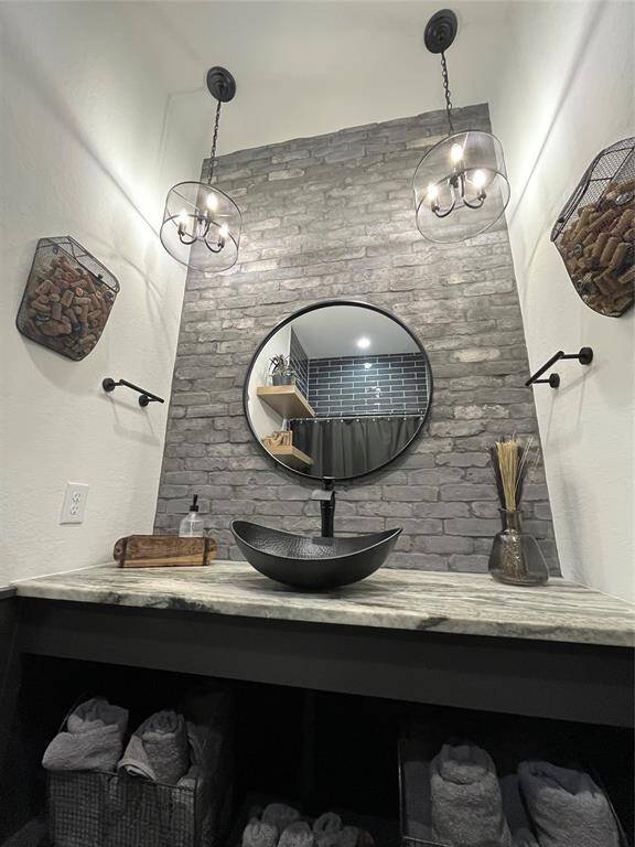 Bathroom off of lounge and outdoor areas