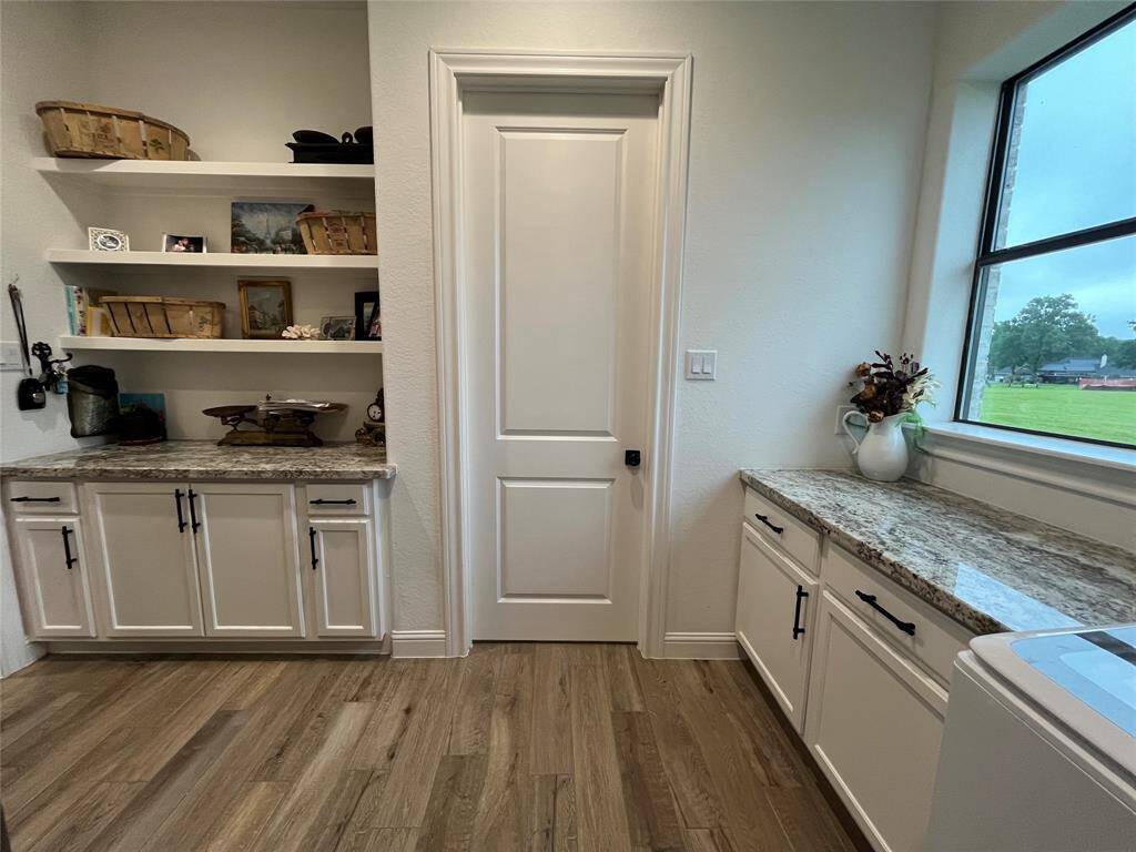 Utility area with tons of storage