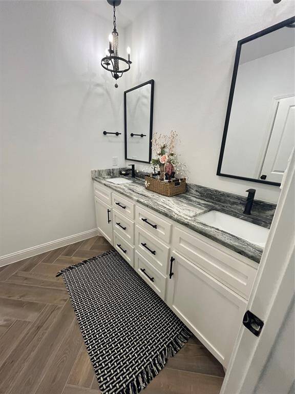 Full bath upstairs accessible from bedroom or gameroom area