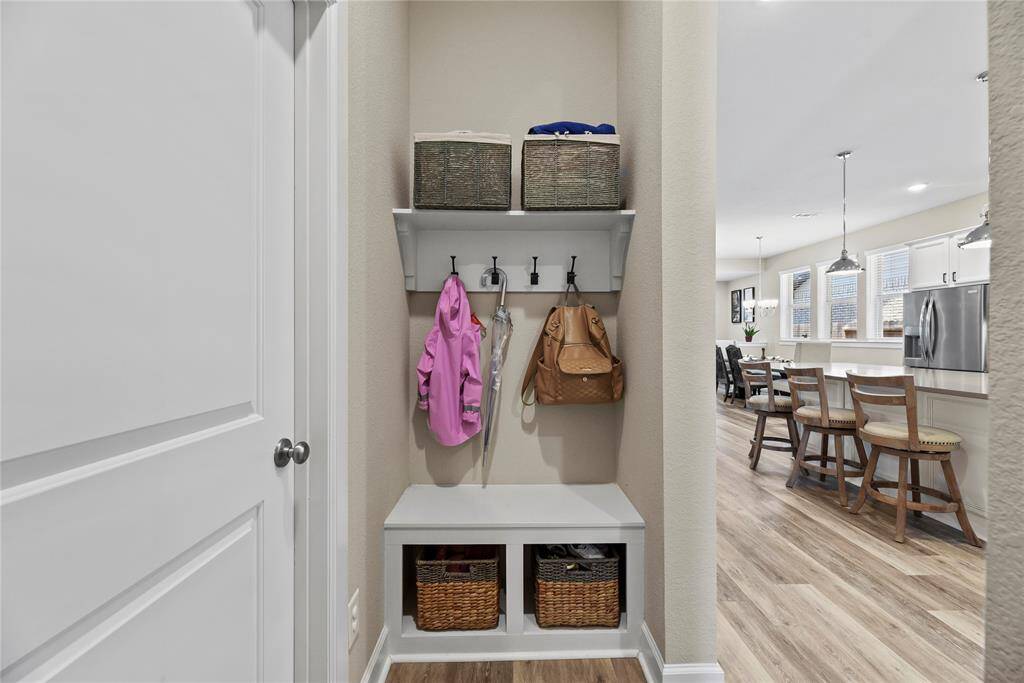 The perfect use for this space is a mud closet! A built-in bench and storage cubbies.