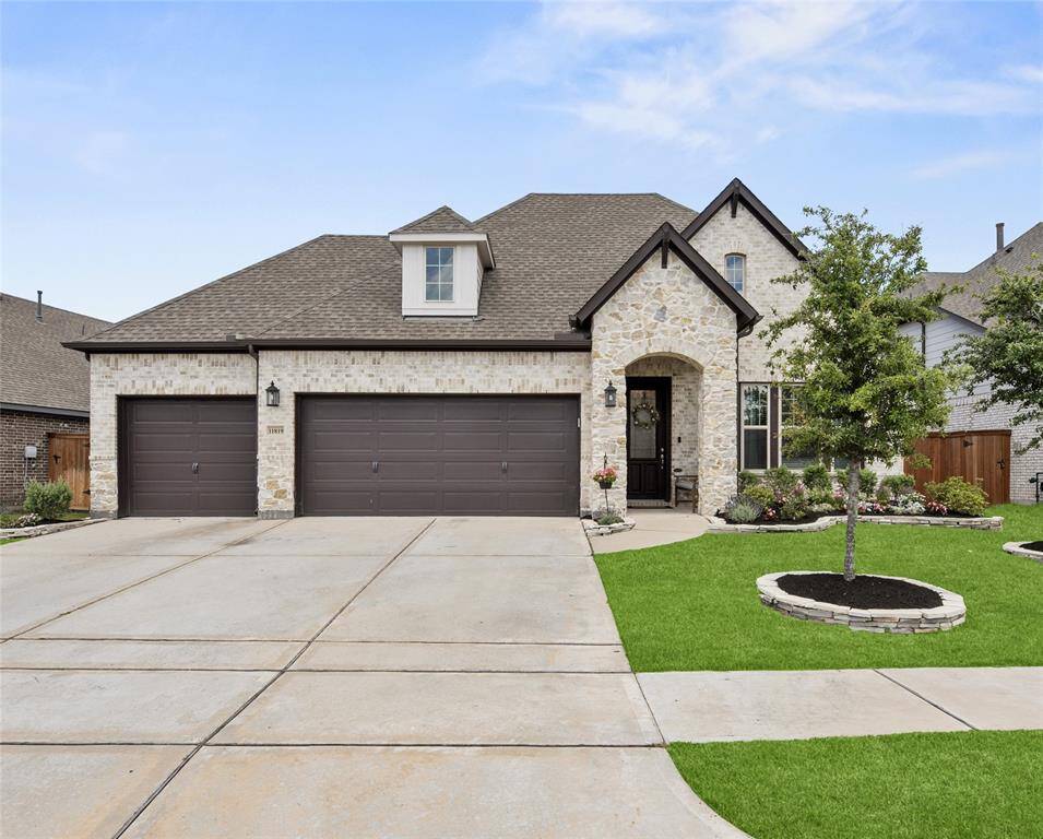 Such an impressive modern one-story home with plenty of driveway space for your vehicles and guests.