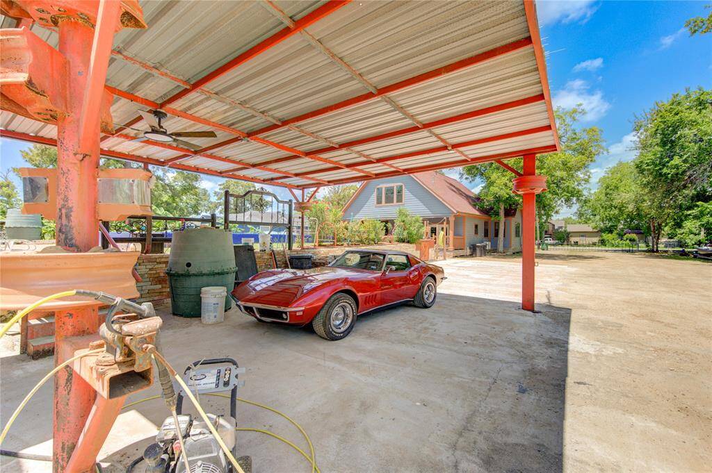 Carport with 1968 Corvette is negotiable