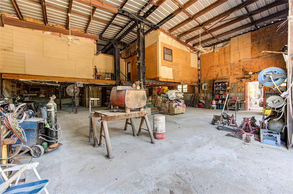 Spacious 56x44 ft. garage/workshop. Bring your business.