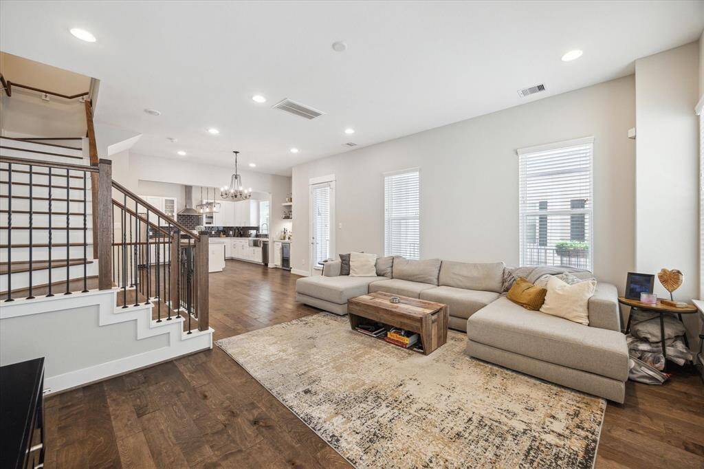 This modern open-concept kitchen and living area is perfect for entertaining.