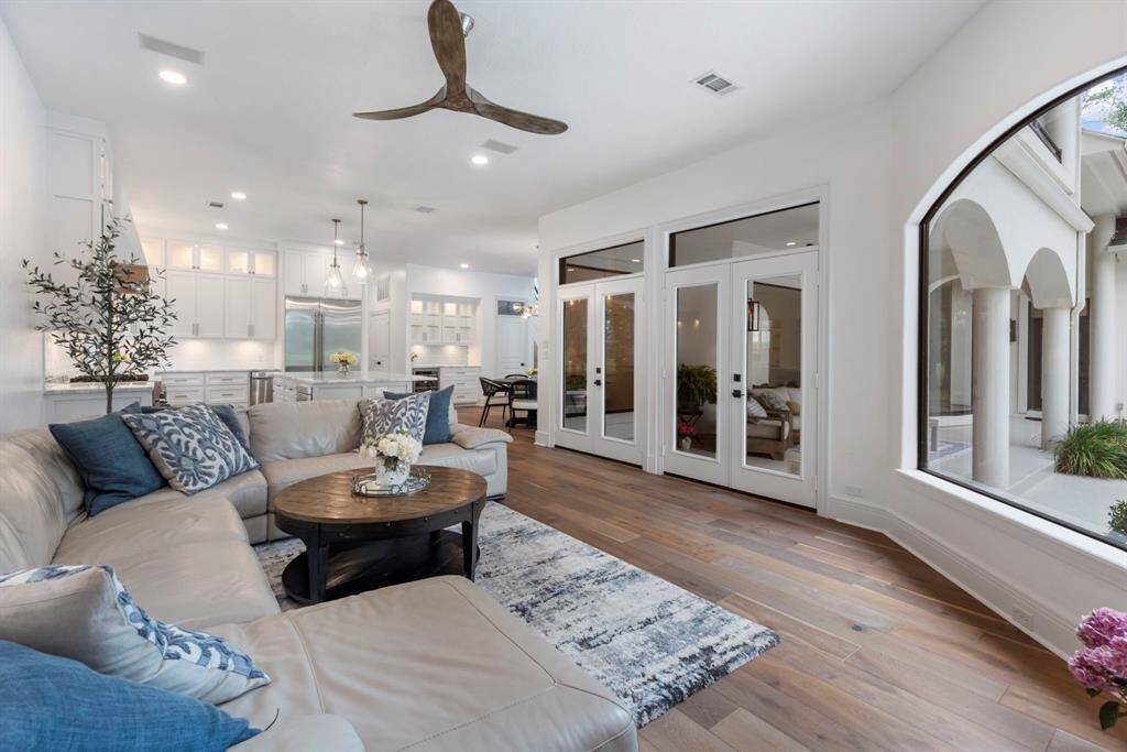 Double French doors lead to the exquisite covered patio!