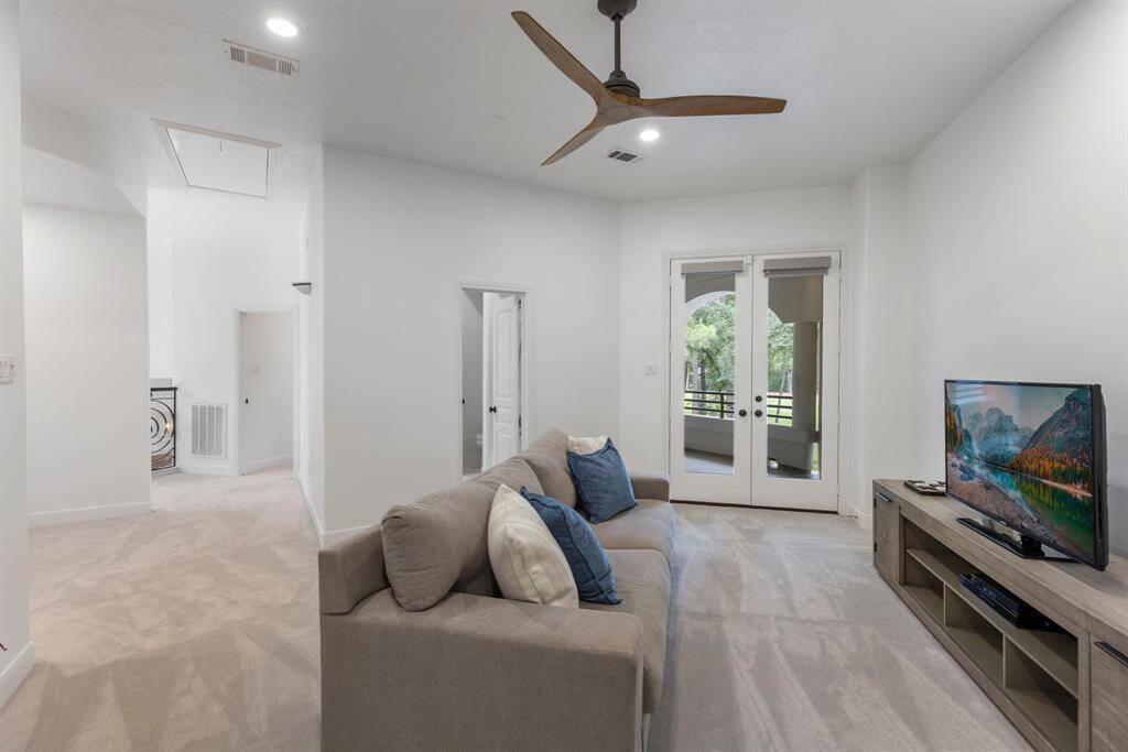 The spacious game room offers a stylish retreat, complete with recessed lighting, an updated ceiling fan.The game room provides direct access to one of the secondary bedrooms and a full bath, as well as a stunning, finished-out second-floor balcony.