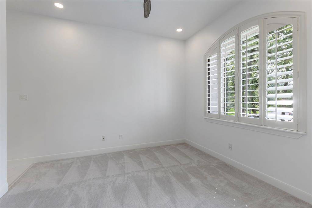 Secondary bedroom #3 is large in size and features a walk-in attic space with 1-inch premium decking.