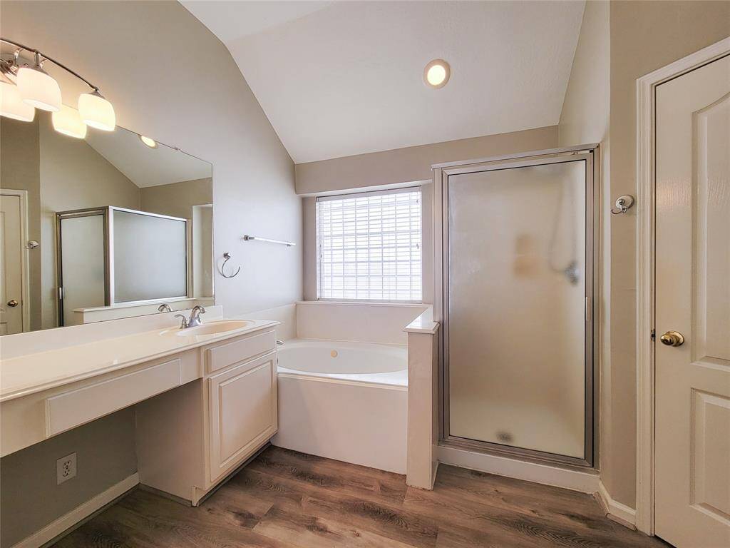 Primary Bathroom with separate shower & tub.