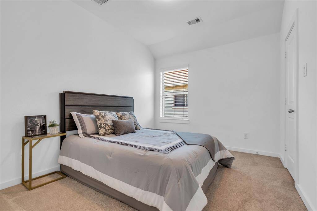 The secondary bedrooms are located upstairs.