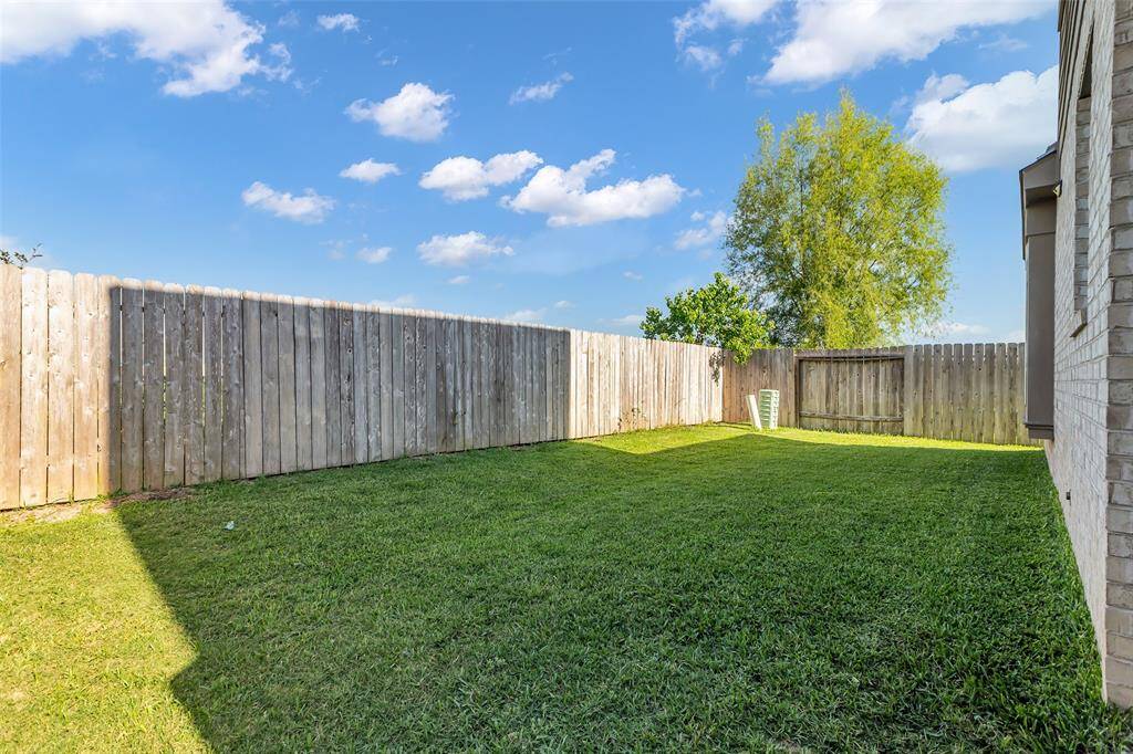 The backyard offers great privacy, with no rear neighbors to interrupt your serene space.