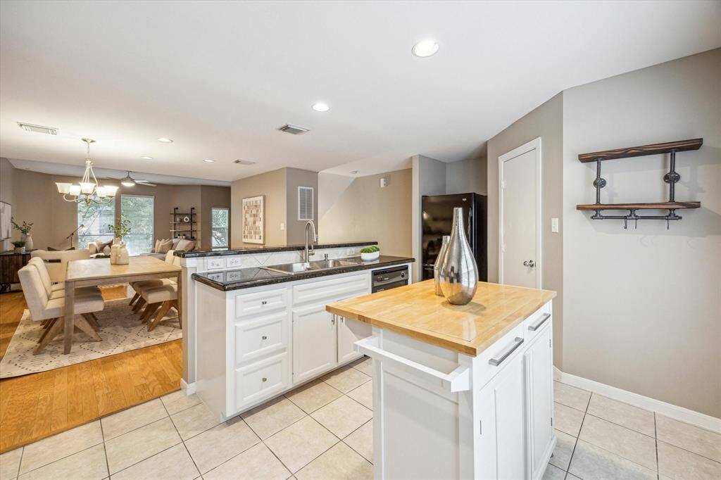 This immaculate kitchen has tons of countertop space for easy meal prep and clean up. With a large pantry and ample cabinetry, you will have plenty of room for all your favorite kitchen gadgets here.
