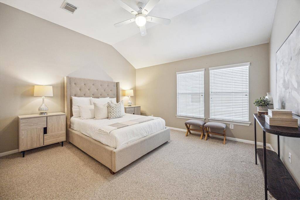 Tucked away on the private third floor, the spacious primary suite offers a peaceful retreat with soft neutral tones, plush carpet, and a large walk-in closet. Just steps away, a spa-like ensuite bathroom and nearby office or study complete this secluded and serene space.