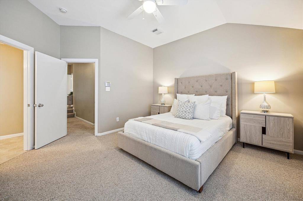 You’ll have sweet dreams in this posh owner’s retreat tucked away on the private third floor, featuring plush carpet, soothing neutral tones, and a spacious layout. Enjoy the luxury of a large walk-in closet, a spa-like ensuite bathroom, and a private office or study just steps away.