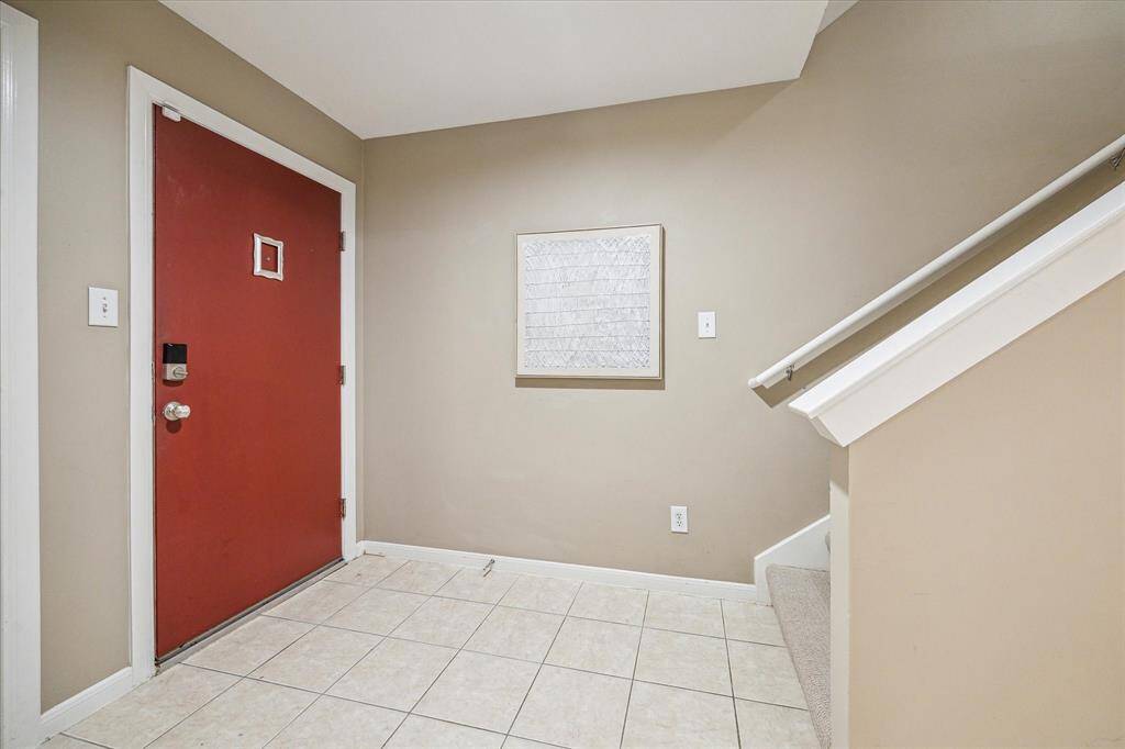 The foyer welcomes you and your guests with fresh finishes, including tile flooring, neutral paint, and a light, inviting atmosphere. Step inside and discover all the thoughtful details this home has to offer.