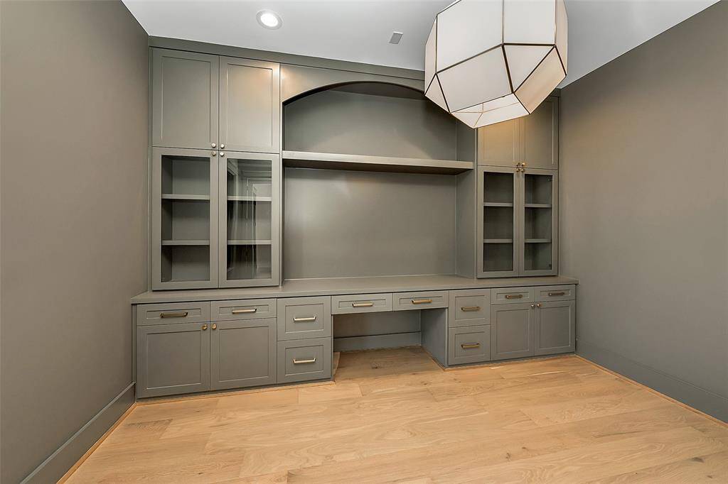 Downstairs home office with double French doors.