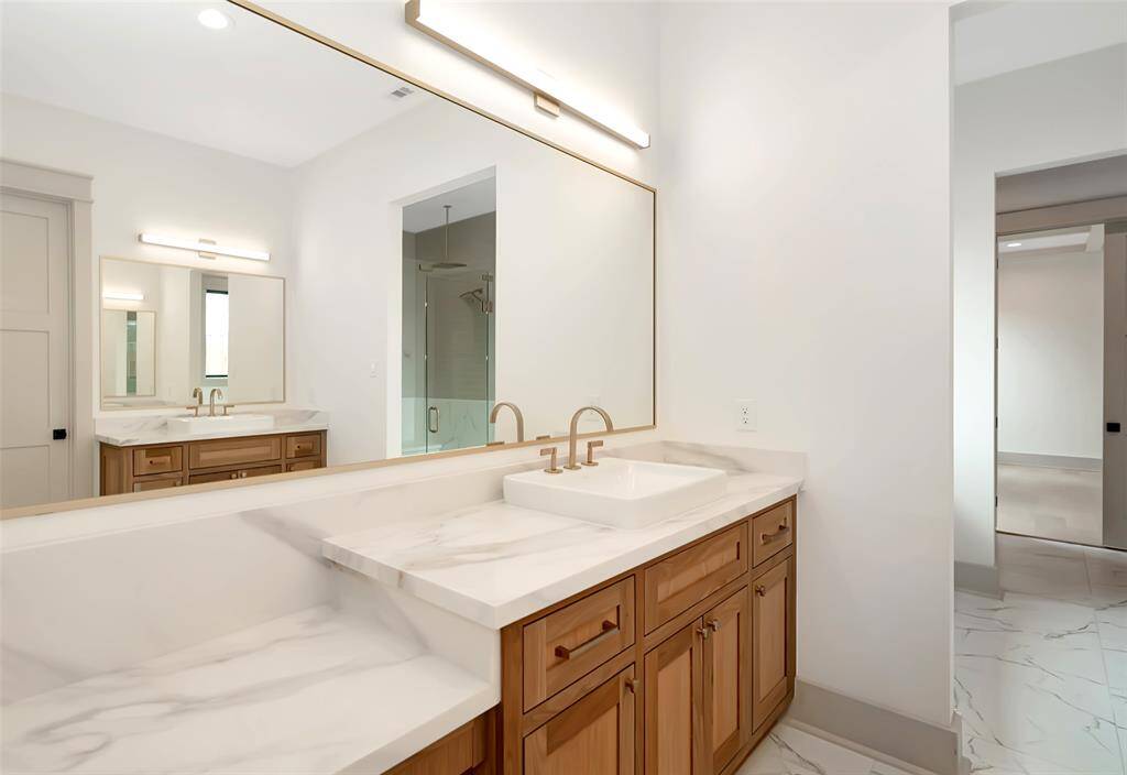 His and Her vanity in primary bathroom. 1st floor.