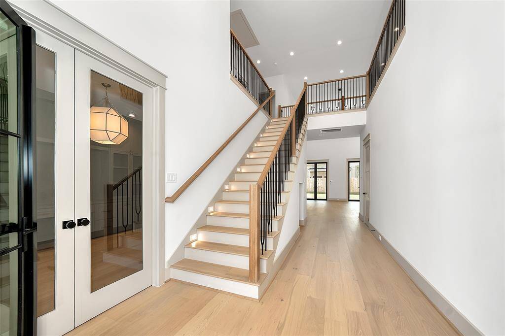 Beautiful foyer with office on the left and 4 bedrooms upstairs
