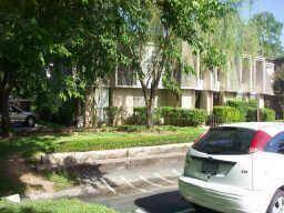 Complex features lovely landscaping throughout