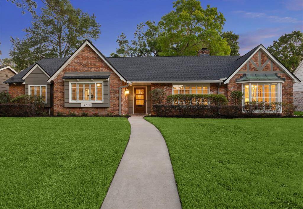 Welcome to 12707 Taylorcrest Road, a charming home nestled in the sought-after Fonn Villas community. The timeless brick, double-pane windows, and inviting flagstone front porch create a warm and welcoming first impression.