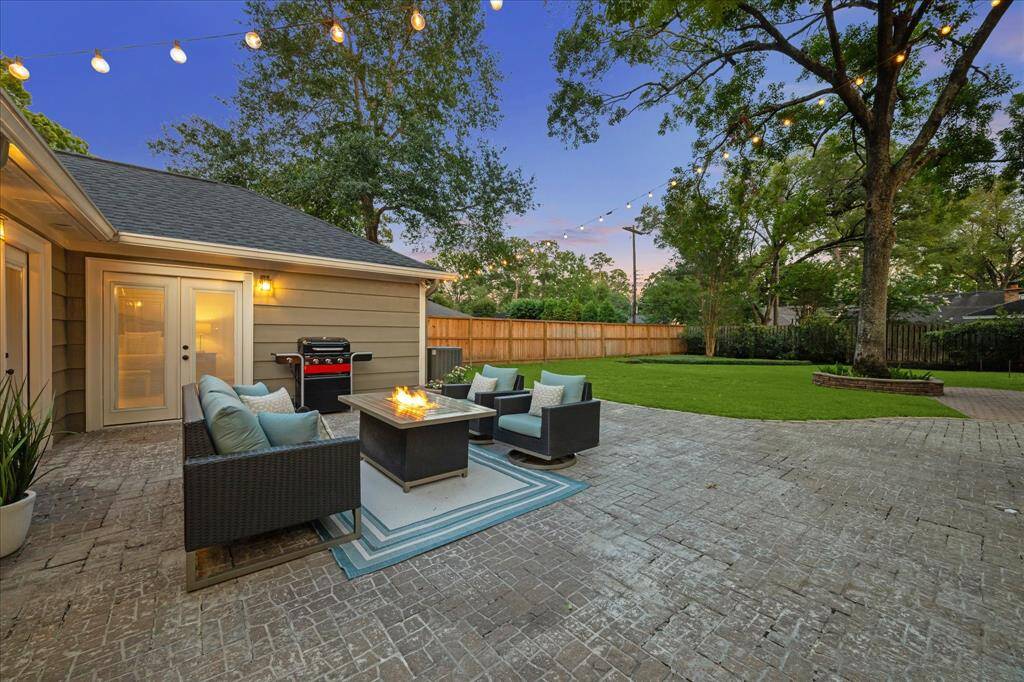 Enjoy a beautifully maintained backyard with a cobblestone paver patio—perfect for outdoor entertaining or relaxing. The spacious lot offers plenty of room for gardening, play, or future improvements, all within a private and serene setting.