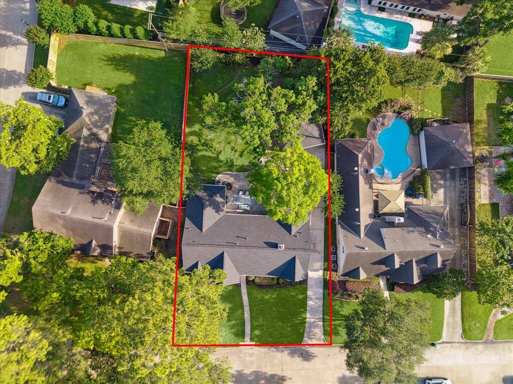 Aerial view showcasing the beautiful Fonn Villas community, tree-lined streets and spacious yards.