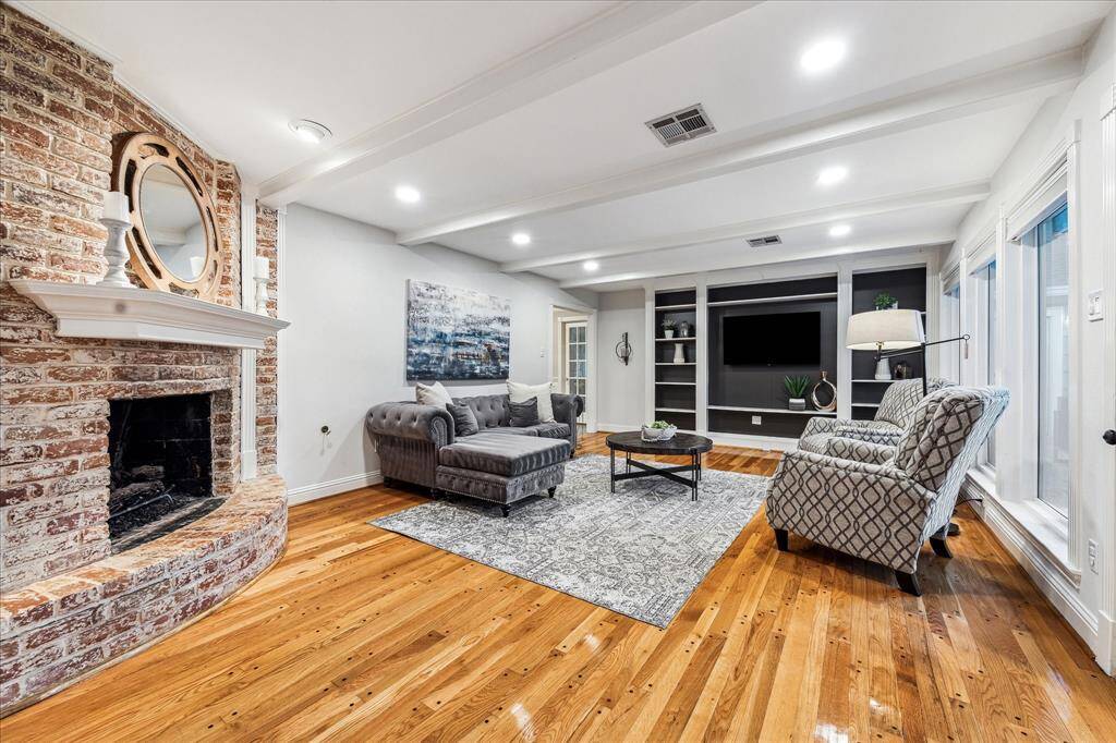 The family room provides direct access to the bedrooms located on the left side of the home.