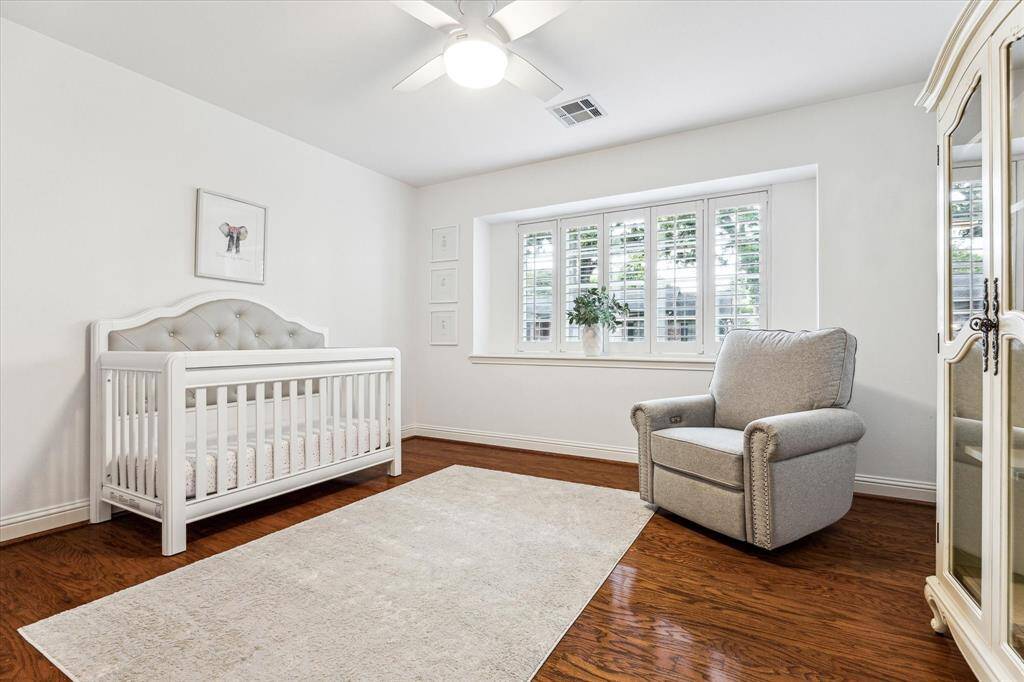 Spacious bedroom overlooking front of home.