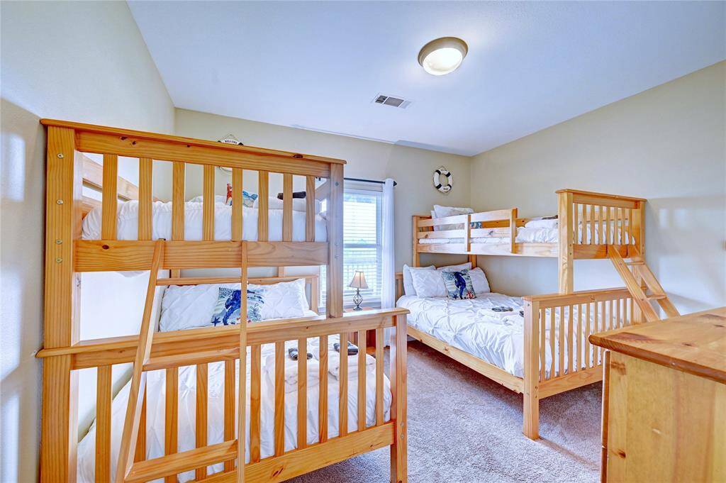 Downstairs bunk room with double beds below.  This room sleeps 6 kids easily.  Or perhaps a large family.