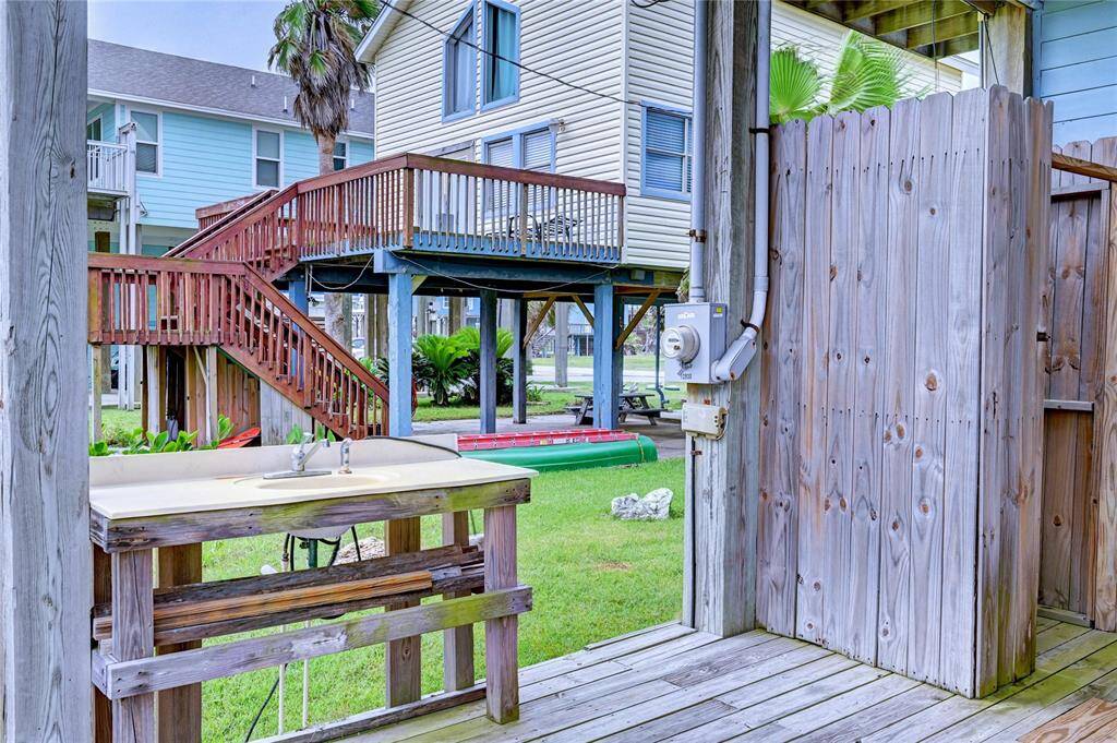 Sink and outdoor shower make for a safe place to clean tonight's fish dinner, then shower up before heading back inside.