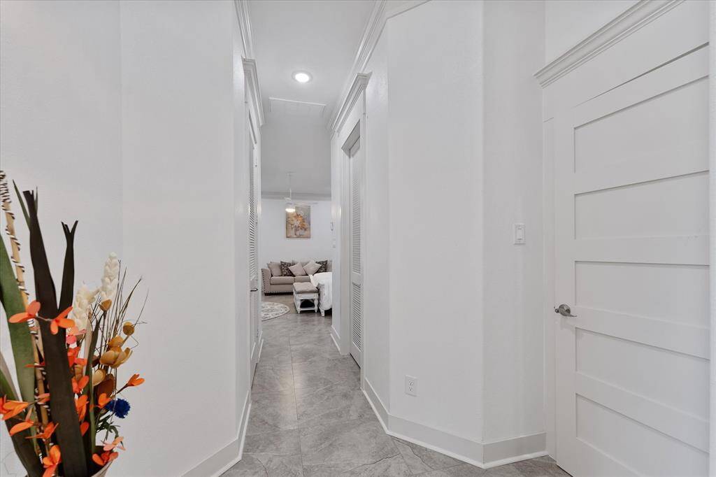 This Master bedroom features an en-suite bathroom as well as two walk-in closets!