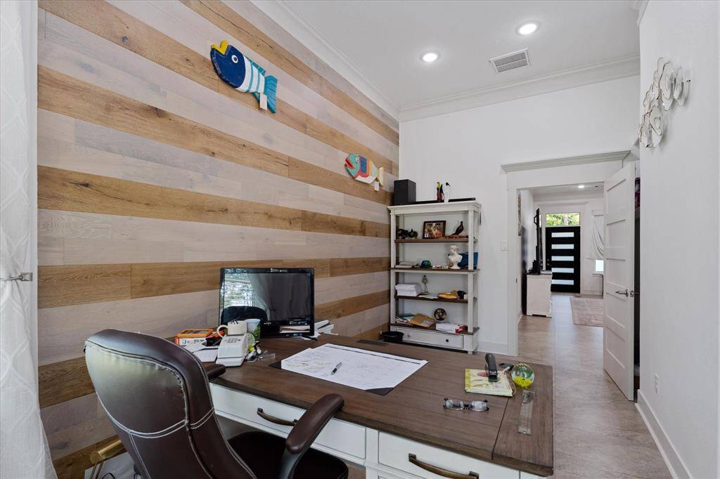 This office is located adjacent to the master bedroom and measures 10'6" x 16'3".