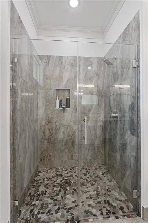 Enjoy this recently installed glass door entrance at this shower!