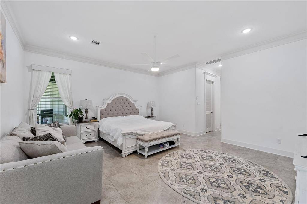 This master bedroom measures 18'3" x 17'2"- plenty of decorating options here.
