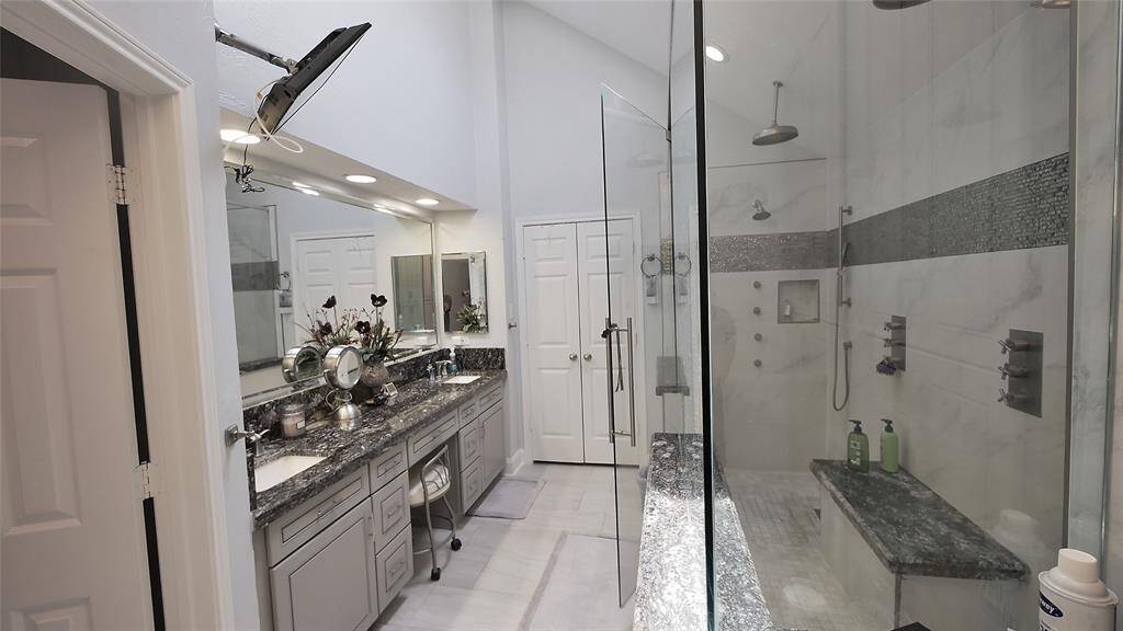 View of Double Sink and Large Shower