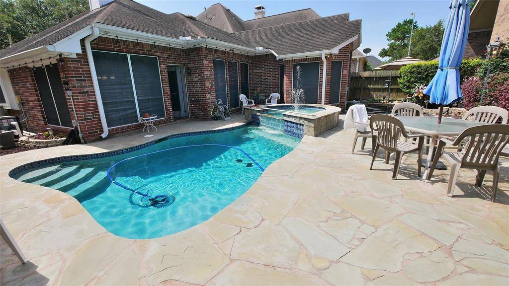 Another view of the backyard pool area