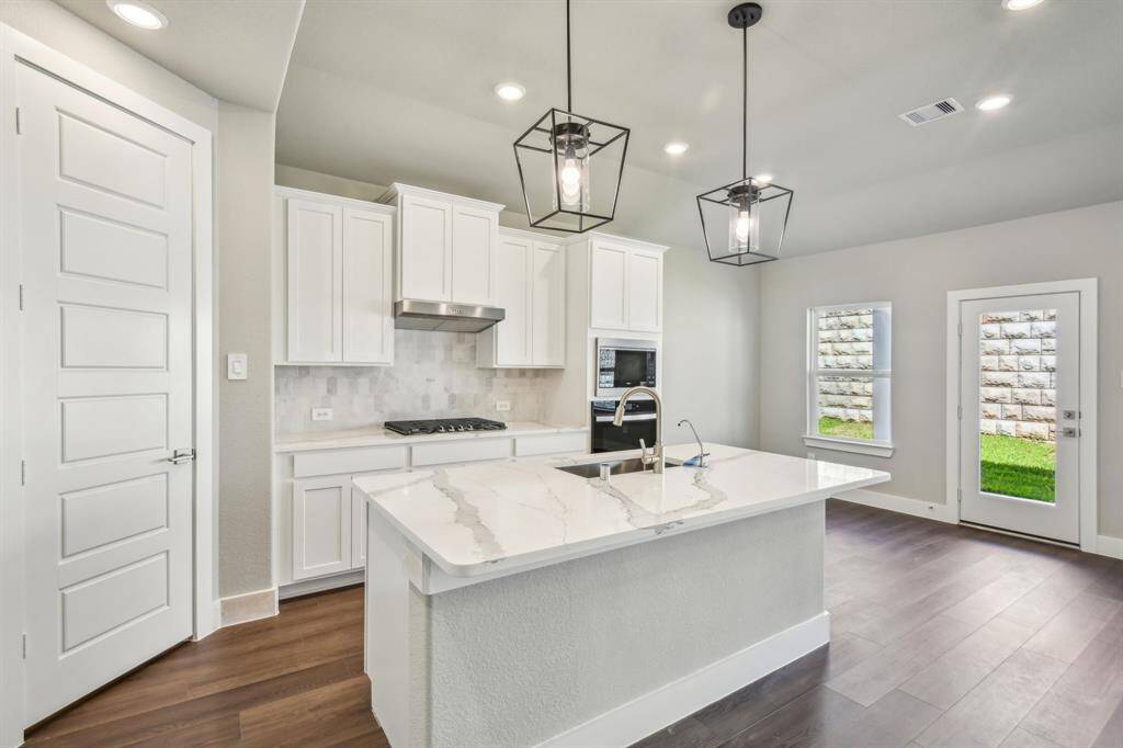 Photo is not of the actual home but is an inspirational photo of builder’s model home and may depict options, furnishings, and/or decorator features that are not included.