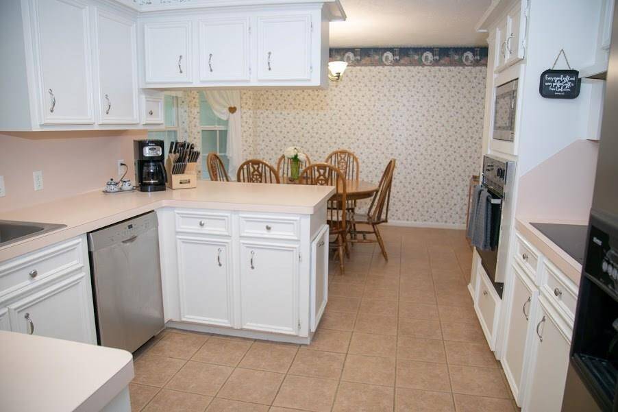 Kitchen area looking into dining area.