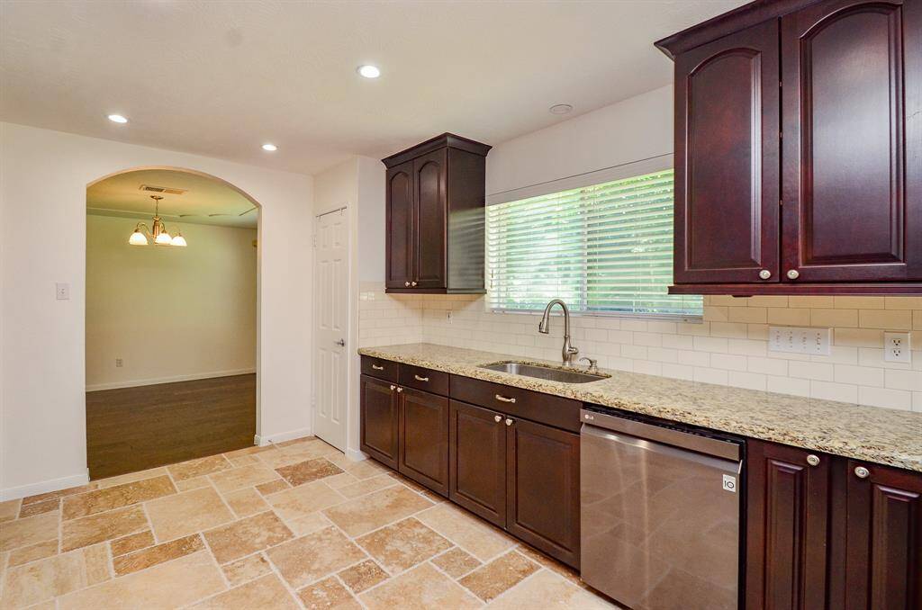 Another view of the kitchen open to the formal dining