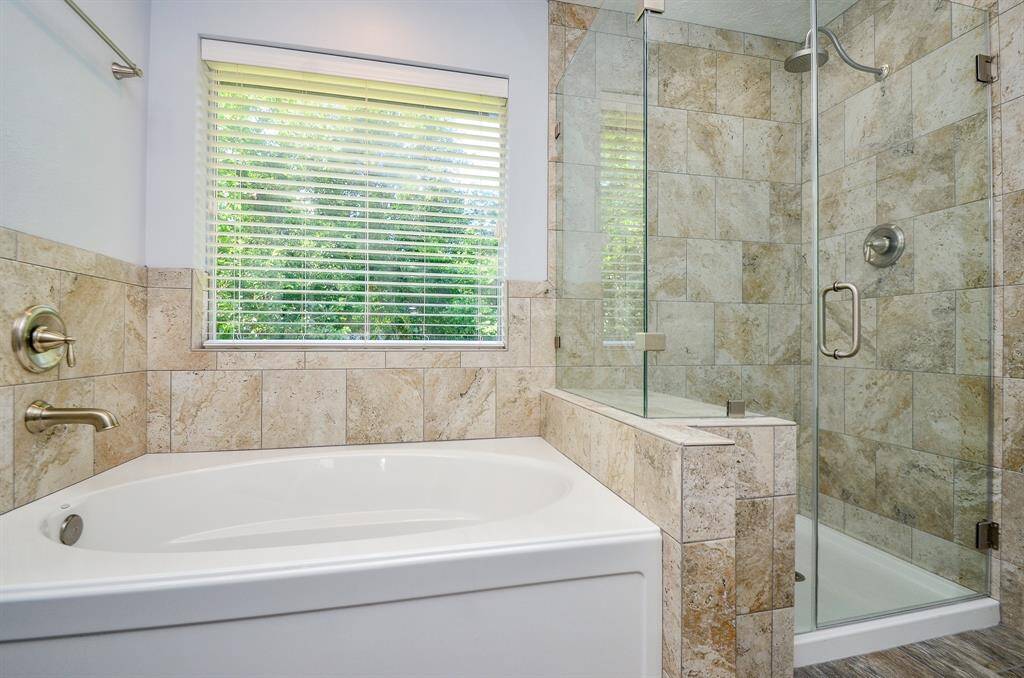 Luxuriuos soaking tub and separate walk-in shower