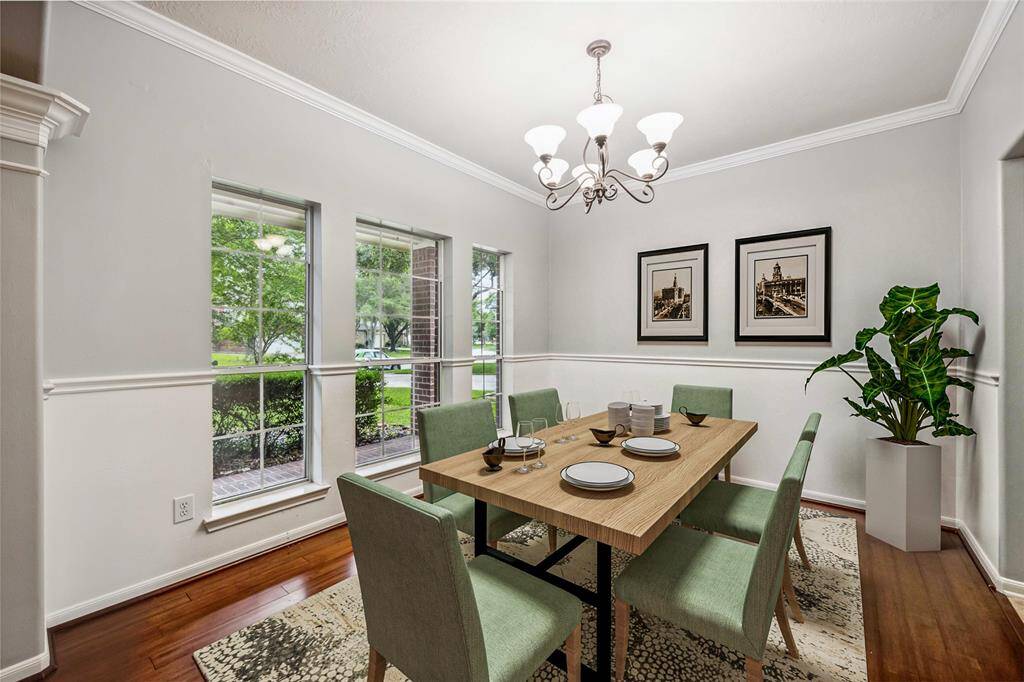 Formal dining room to the left when you enter- virtually staged