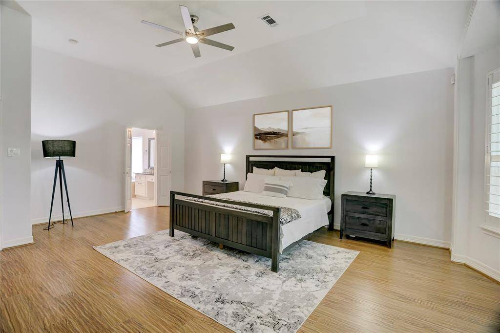 This spacious bedroom offers versatile layout options to suit your style.